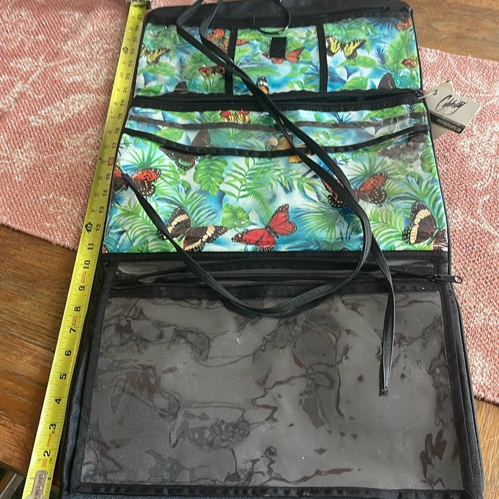 Celebrity zippered jewelry or makeup bag. Multiple storage sections.